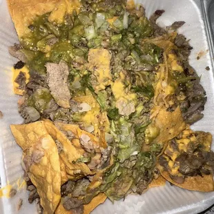 Carne asada nachos. Meat clearly under cooked! And they wouldn't let me change my dish said we don't do that. Too bad you didn't like it.