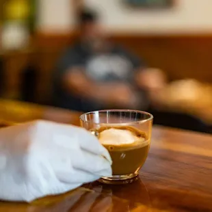 a person sitting at a bar