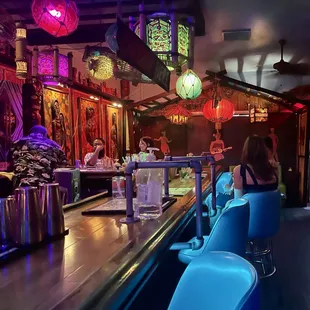 Colorful Tiki themed bar interior