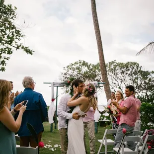 large grass area for ceremony and ocean backdrop