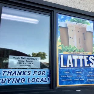 a sign in the window of a business