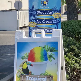 a sign for a tropical ice cream shop