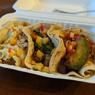 a taco in a styrofoam container