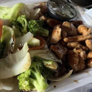 a close up of a meal in a styrofoam container