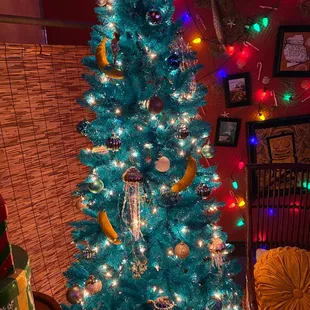 a christmas tree decorated with bananas