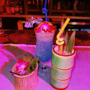 (Left to right) Classic Mai Tai, Poseidon Punch, Bonzai Banana