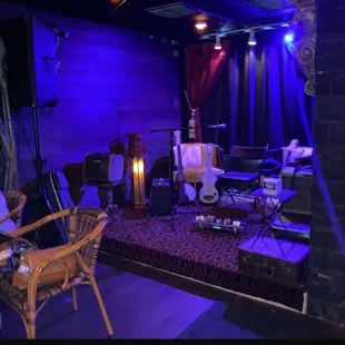 Front window area where they have a band on the weekend or you can sit when there is no band.