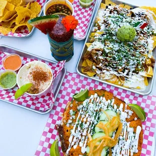 Birria pizza, esquites, al pastor tacos, chips + guac, watermelon margarita