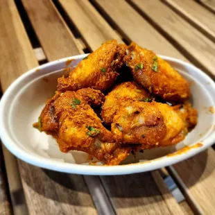 a bowl of fried chicken