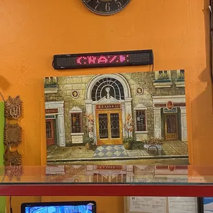 a clock on a yellow wall