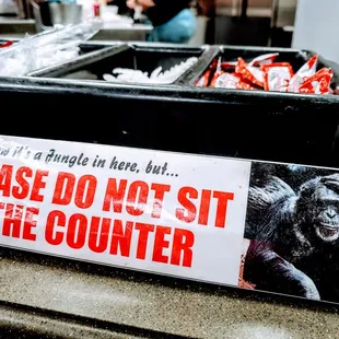 a sign on the counter