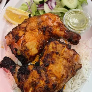 a plate of chicken and rice