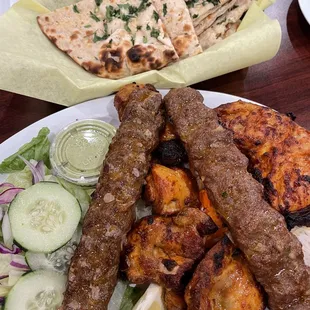 a plate of meat and vegetables