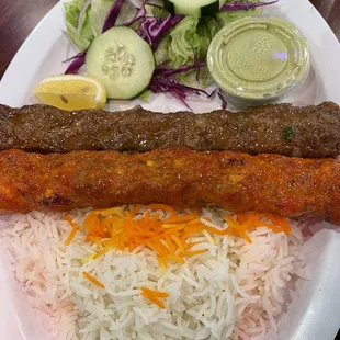 a plate of food with rice and vegetables