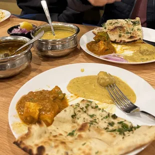 Malai kofta and spicy paneer with garlic and bullet naan