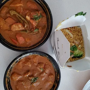three bowls of food on a table
