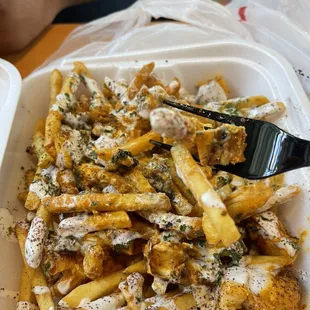 Chicken Tikka Masala fries $10