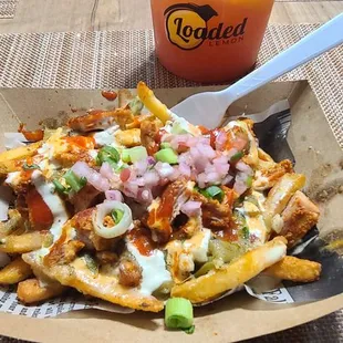 Tikka fries and strawberry lemonade from other truck