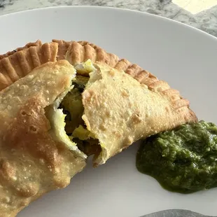 Traditional samosas with pea and potato filling