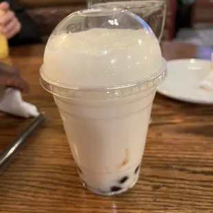 a drink in a plastic cup