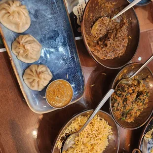 Chicken momo, Chicken Chettinao, Saag Paneer, and rice