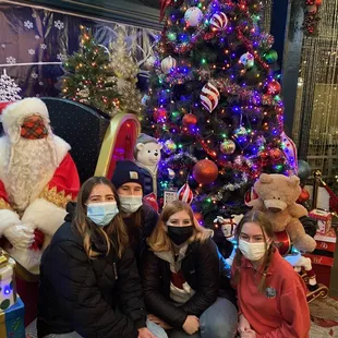 Santa visiting with group of friends