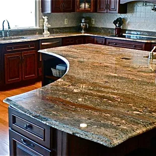 a kitchen with granite counter tops