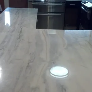 Fabricated &amp; installed in my kitchen as counter &amp; peninsula. I used the same marble in 2 bathroom vanities.