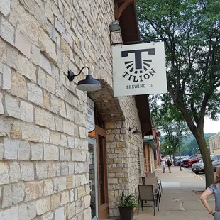 a woman standing in front of a building