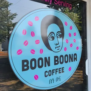 a sign for a coffee shop