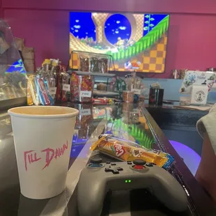 Delicious vanilla latte, candy and some video game action