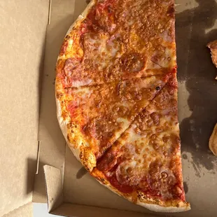 a slice of pizza in a box