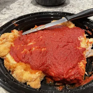 a piece of deep dish pizza