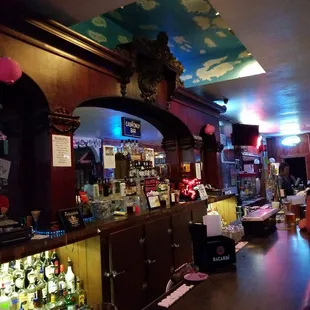 a bar with a lot of bottles