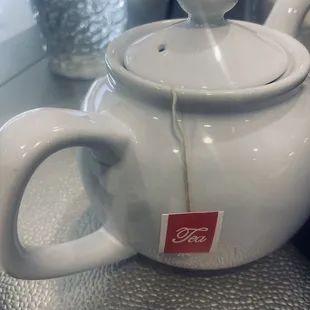 Tea is served in cute little tea kettles.