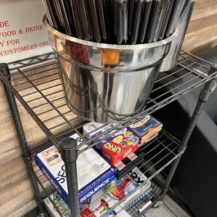 a bucket full of pens and pencils