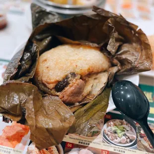 Sticky rice in lotus leaf (unwrapped) / $7.50