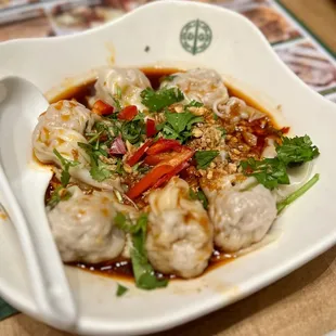 Pork Dumplings in Spicy Sauce
