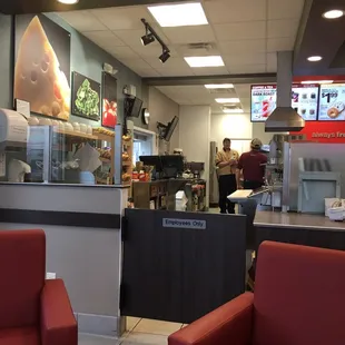 a view of the kitchen and dining area