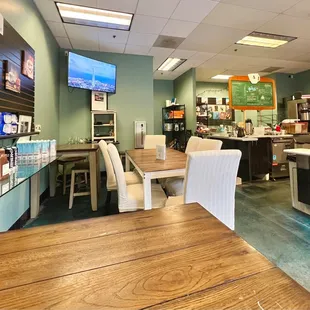 Interior. A few tables; one bar-style (high top) and a dining table which seats six.