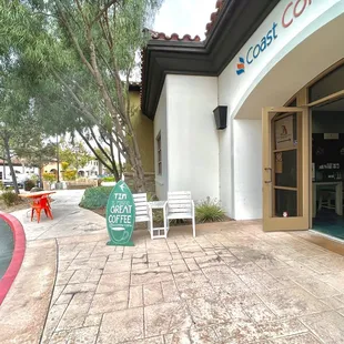 A few tables and chairs for dining outside.