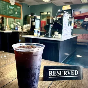 A perfectly crafted iced Americano with 4 shots of espresso.