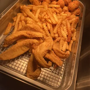 Fried catfish, hush puppies, fries