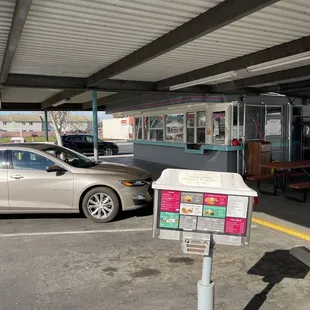 Exterior of building with carhop ordering station