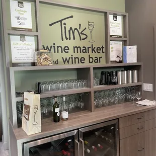 a display of wine glasses and bottles