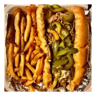 Italian Beef (w/ gyro meat!?!) Sandwich w/fries . OK. Sweet &amp; Hot Pepper is HOT! To Hot for me.Tim Tim&apos;s Halal Grill. W Montrose Ave .