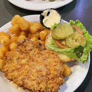 Pork tenderloin sandwich and tator tots