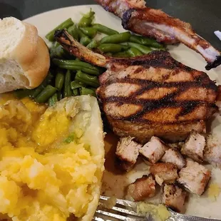 Sorry had already started eating.  Grilled double pork chop, baked potato I drowned in butter and green beans! Awesome!