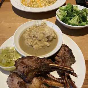 Delicious Lamb Chops with mashed potatoes.  Lobster Mac and cheese with broccoli as side-dish.