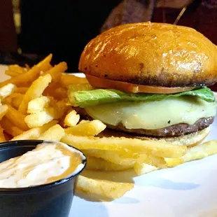 Burning Bear Burger of grass fed New Zealand ground beef, lettuce, tomato, onion and cheese